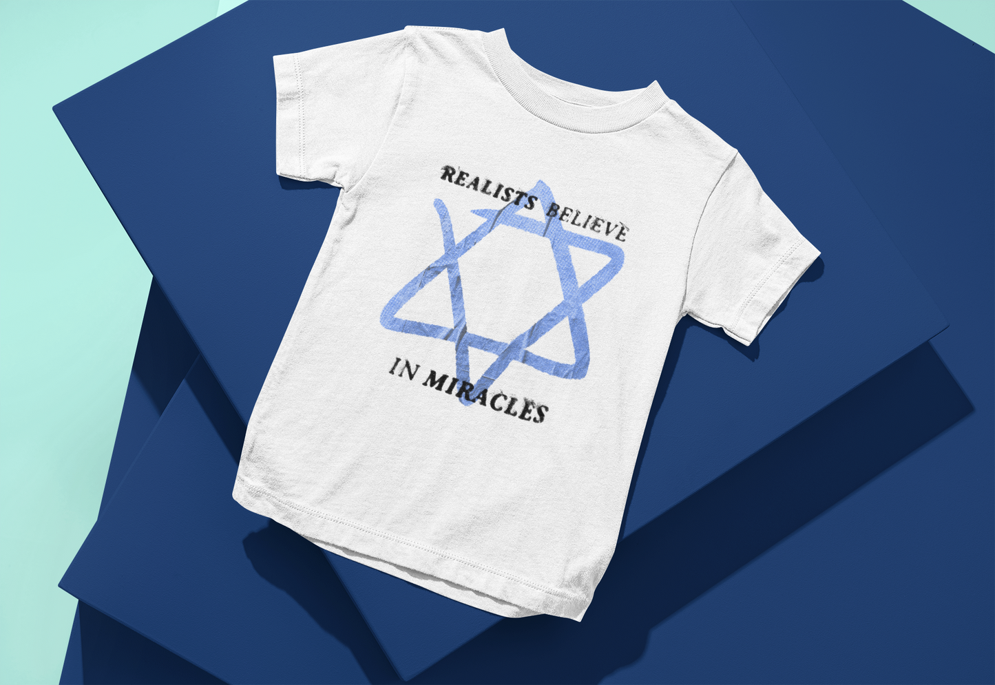 Realists Believe In Miracles Toddler Tee